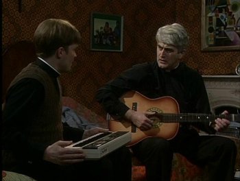 Ted and Dougal making music